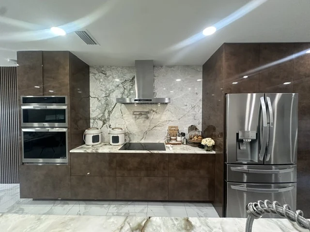 Kitchen cabinetry and coordinated countertop surfaces